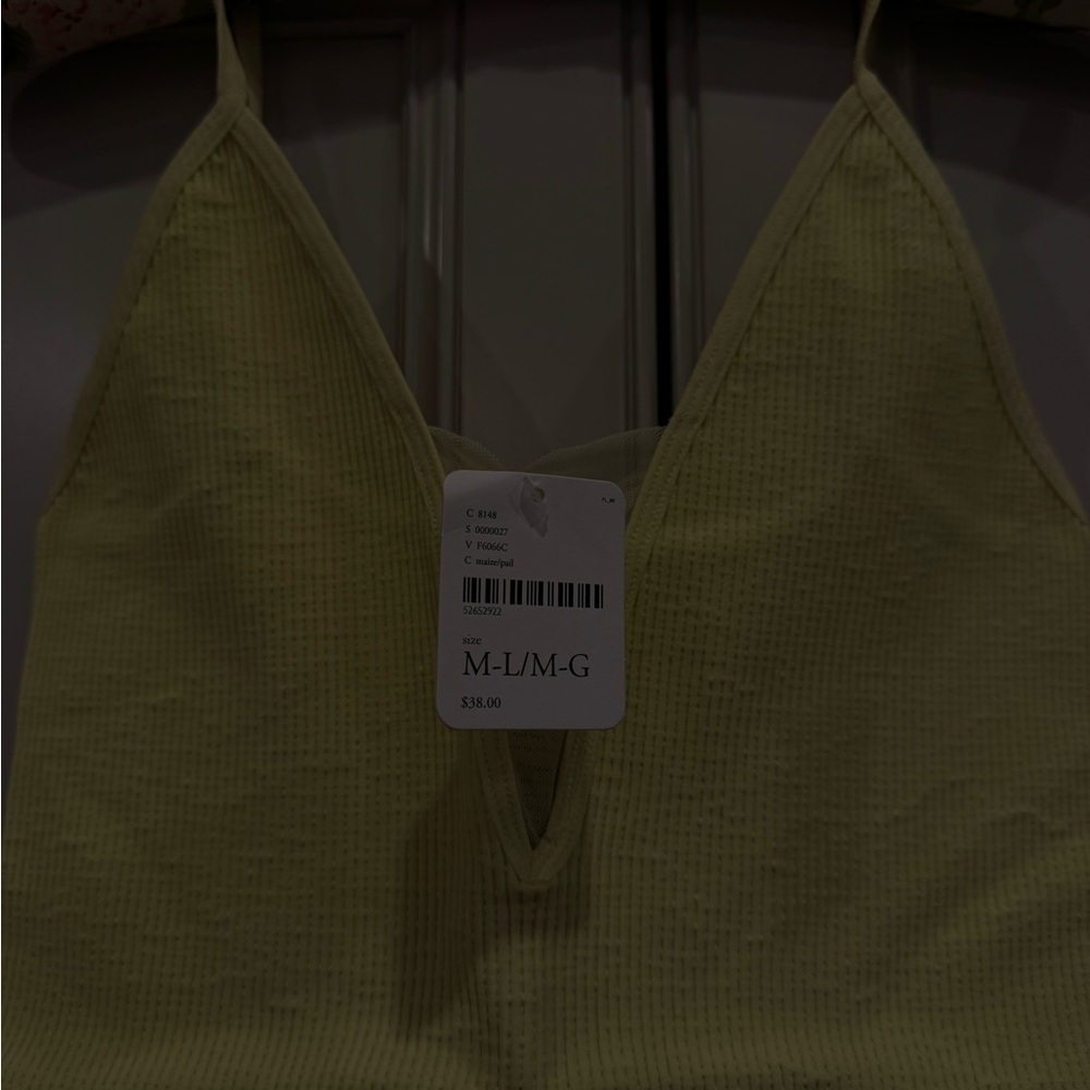 FP Movement by Free People Light Yellow Ribbed V-Neck top/cami